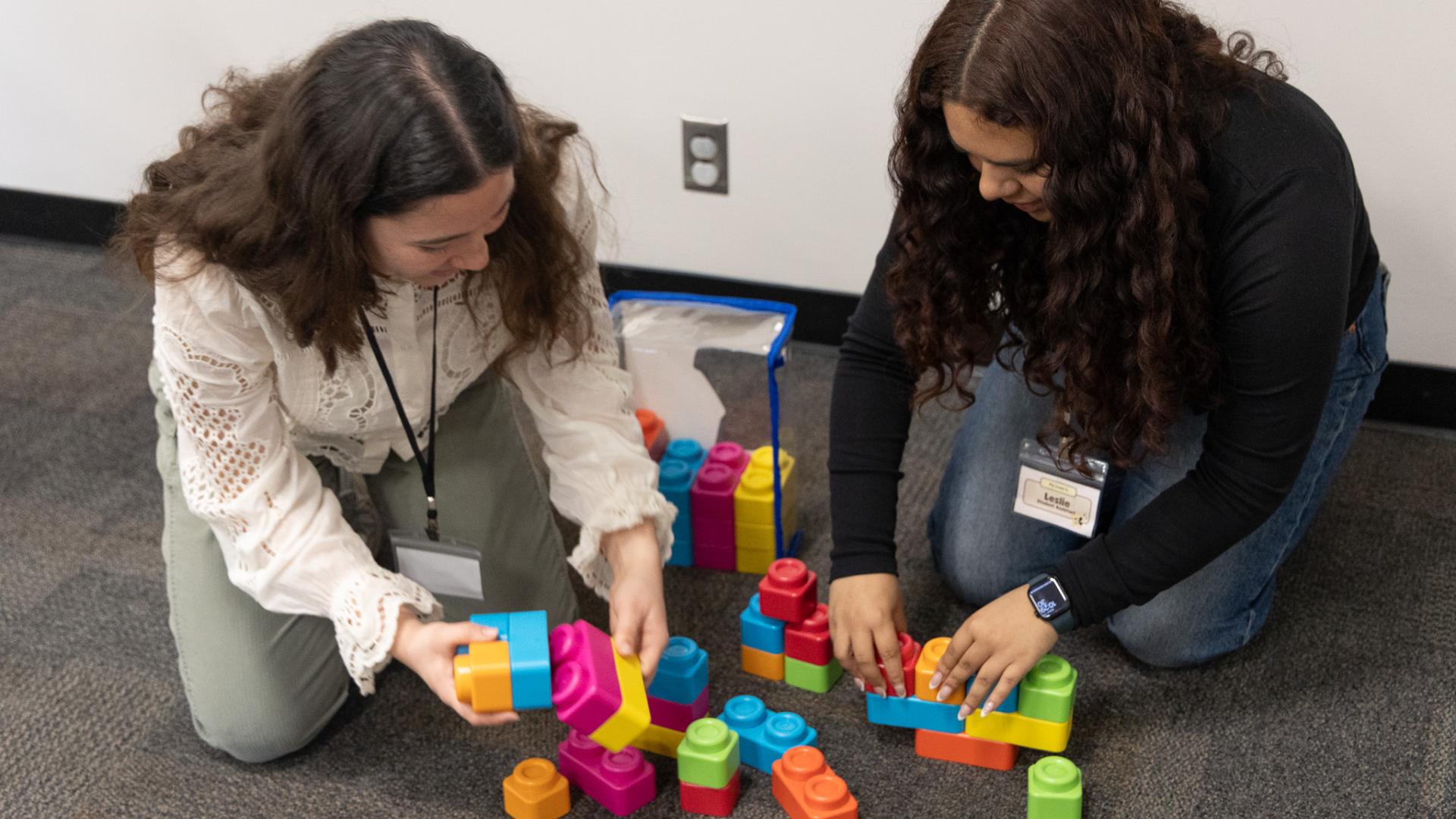 FRC student interns building play set