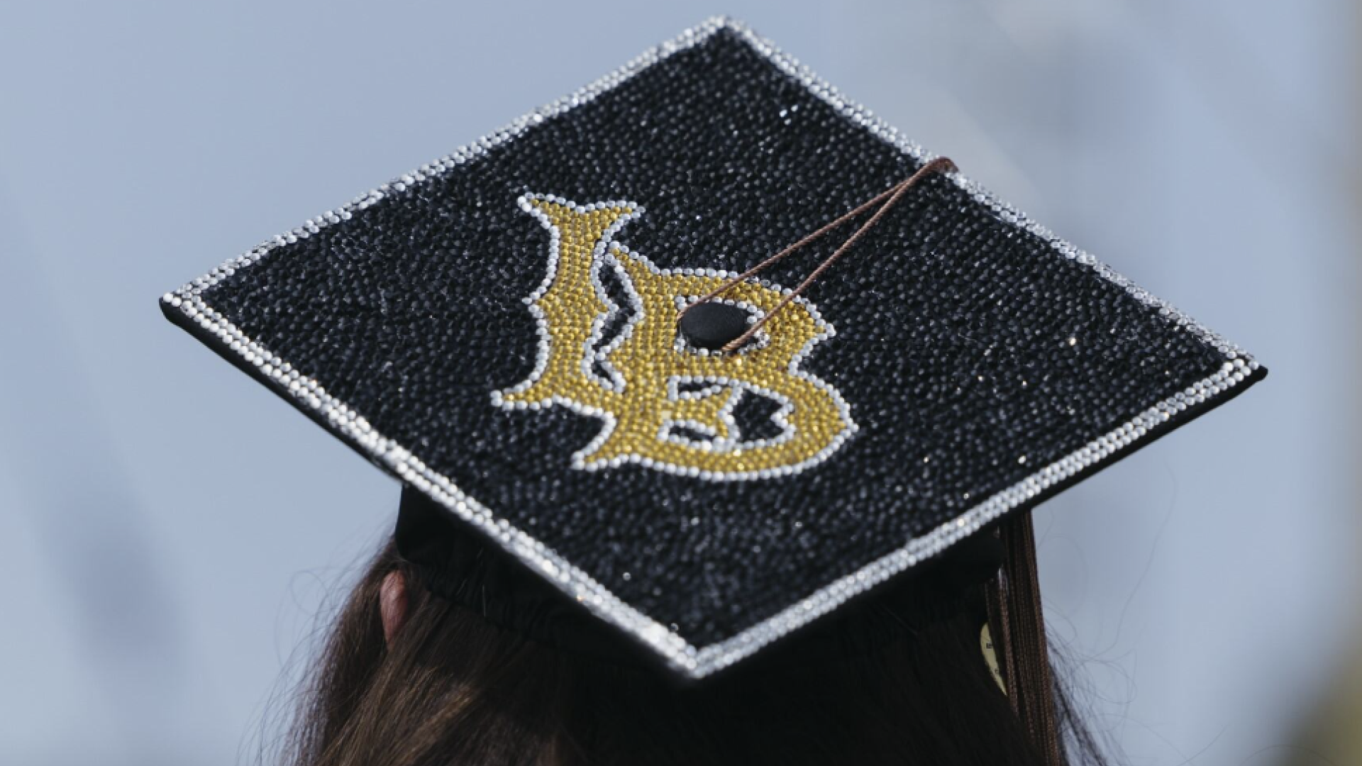 Graduation cap decorated with bedazzled CSULB logo