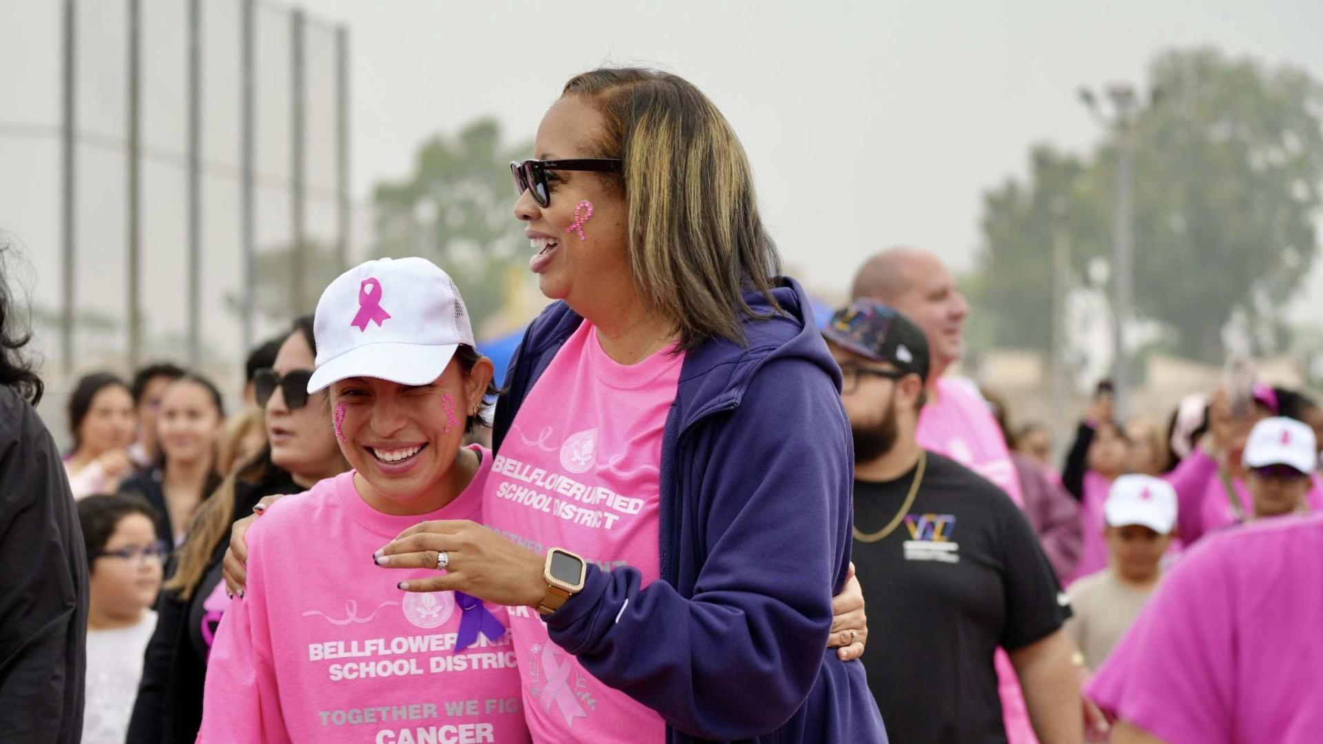 Erin Simon, right, participates in a cancer support walk 