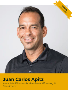 Portrait of Juan Carlos Apitz with yellow banner underneath and small yellow banner in top right corner