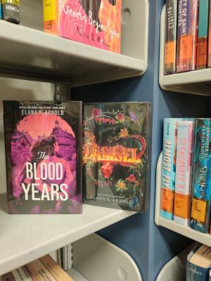 books by Elana K. Arnold books by Elana K. Arnold on library shelf