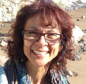 Barbara Doten Barbara Doten is a white woman with brown-red hair and glasses