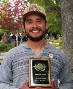 Christian Garcia with award