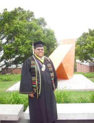 Titus Potter '10 wearing graduation regalia Titus Potter '10 wearing graduation regalia