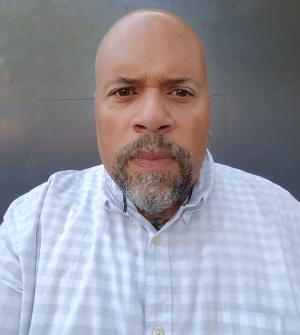 man in a blue shirt