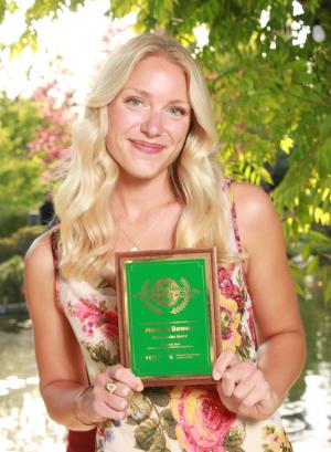 Morgan Bowen holding her award plaque