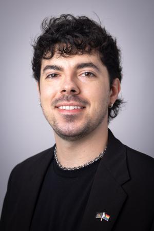 a man posing for a professional headshot