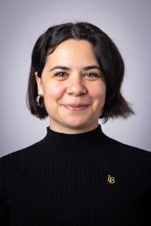 a woman smiling for a professional headshot