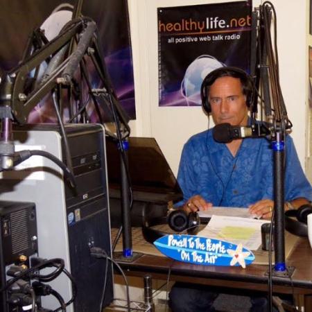 Wayne Powell hosting his radio show in studio