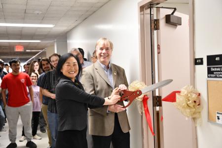 Dean cuts ribbon on electronics lab