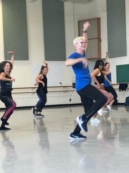 Andy Vaca leads dancers in a studio performance.