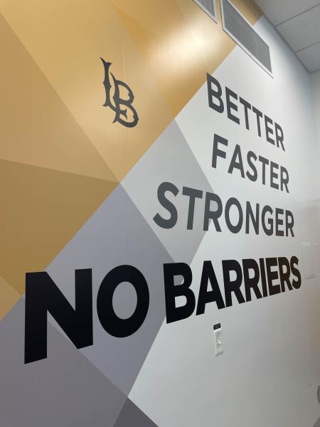 Better Faster Stronger No Barriers signage