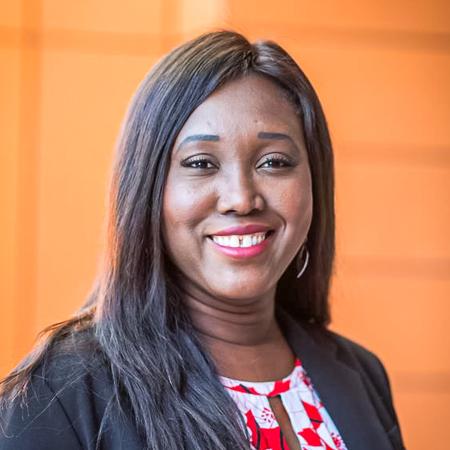 Fatou Olshanski Fatou Olshanski in front of orange background