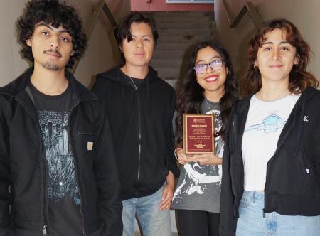 Students holding Edison Award