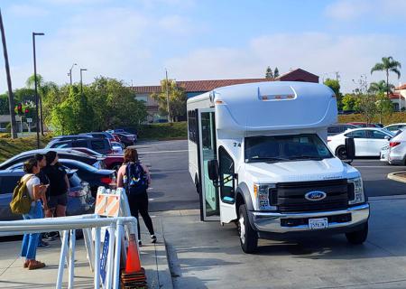 Shuttle picking up students