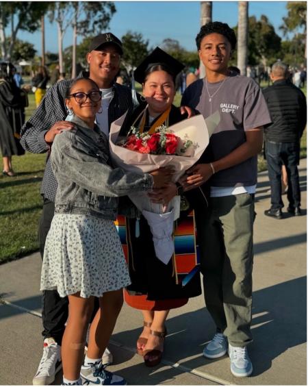 Erica Martinez and her children at graduation