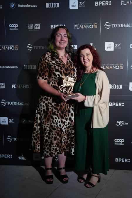 Alessandra Balzani and Jaclyn Taylor holding Flaiano International Prize for Italian Studies