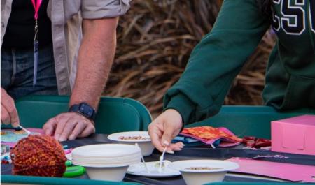 two people doing crafts 