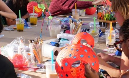 people making paper lanterns