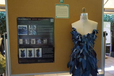 A poster and costume made from recycled materials