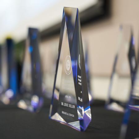 Crystal awards displayed on a table
