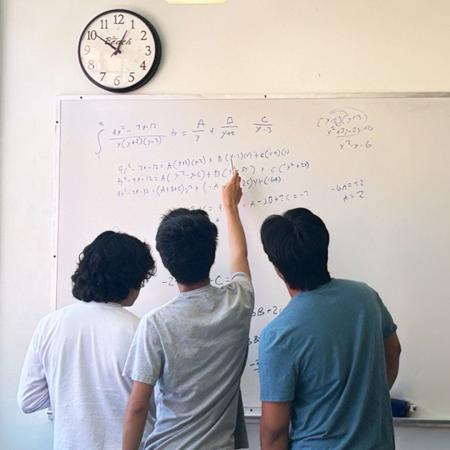 CSULB math students working on a problem