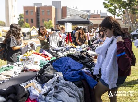 Students looking at clothes