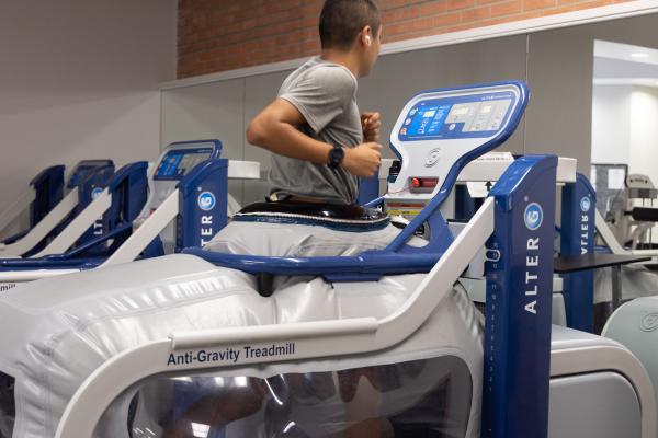 Student running on Alter G treadmill