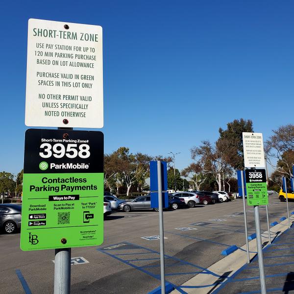 Short Term Parking post with ParkMobile instructions.
