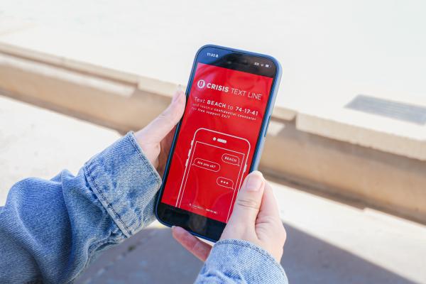 Crisis resources on a phone.