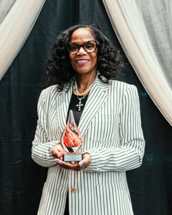 Provost Scissum Gunn with Leadership Award.