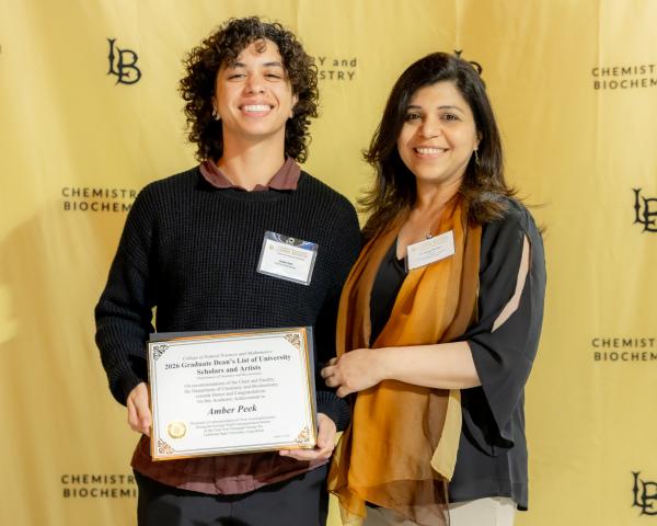 Amber Peek and Dr. Bhandari at award ceremony.