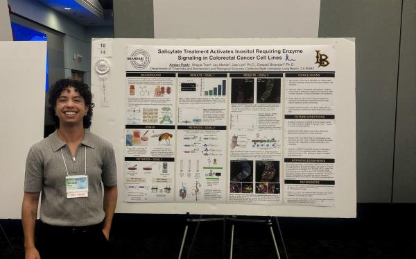 Amber Peek with poster presentation for Don Eden Award.