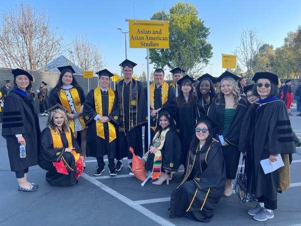 AAAS faculty and graduates in regalia at Spring '26 Commencement