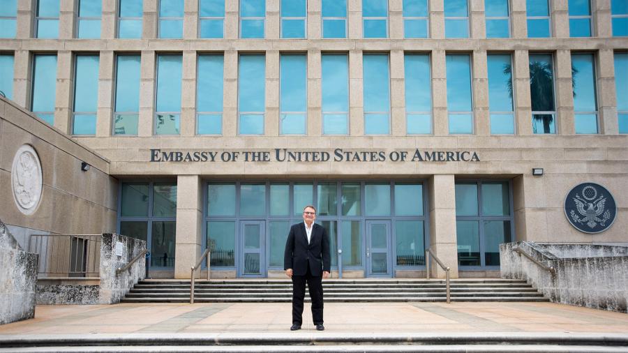 Diplomat Benjamin Ziff standing in front of US embassy in Cuba