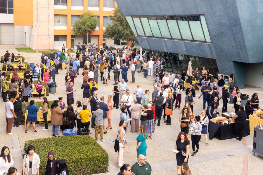 Crowd at convocation breakfast in the dance courtyard.