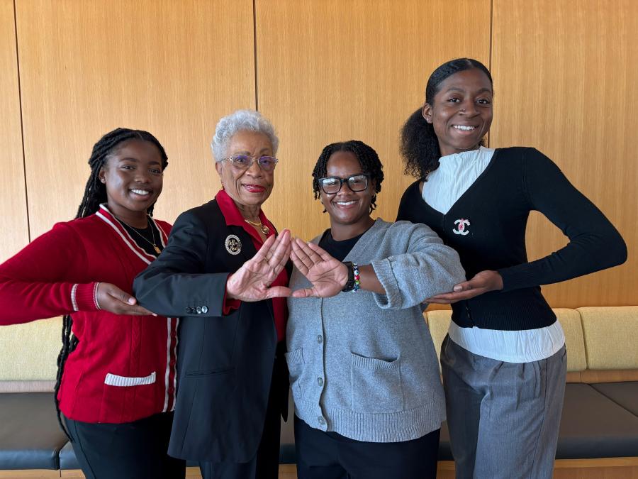 Patricia Newby, center, surrounded by CSULB Black students