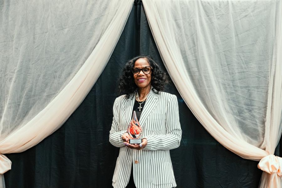 Provost Karyn Scissum Gunn with Leadership Award.
