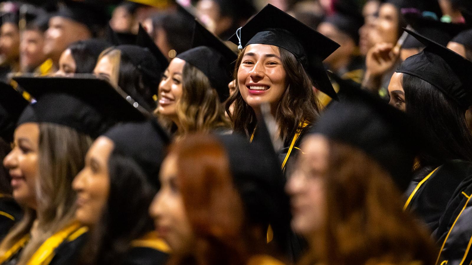 Grad looks away from others