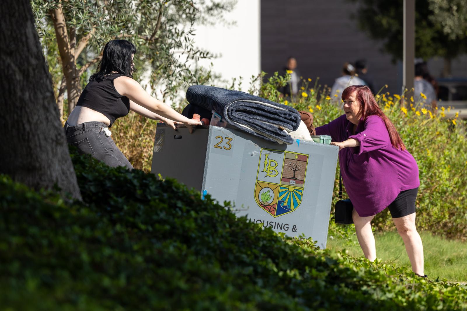 Mother and daughter moving in