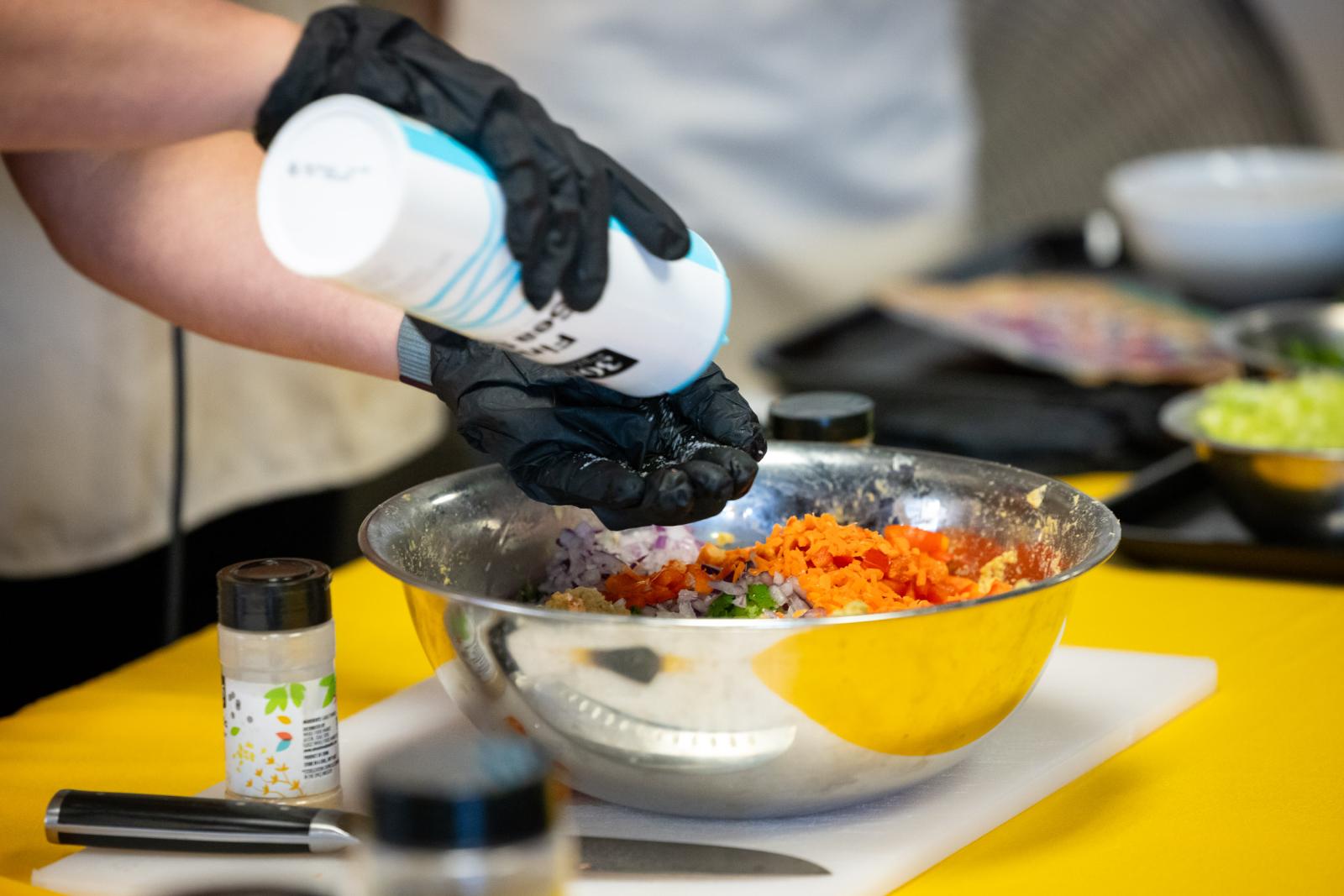 Photograph preparing a salad