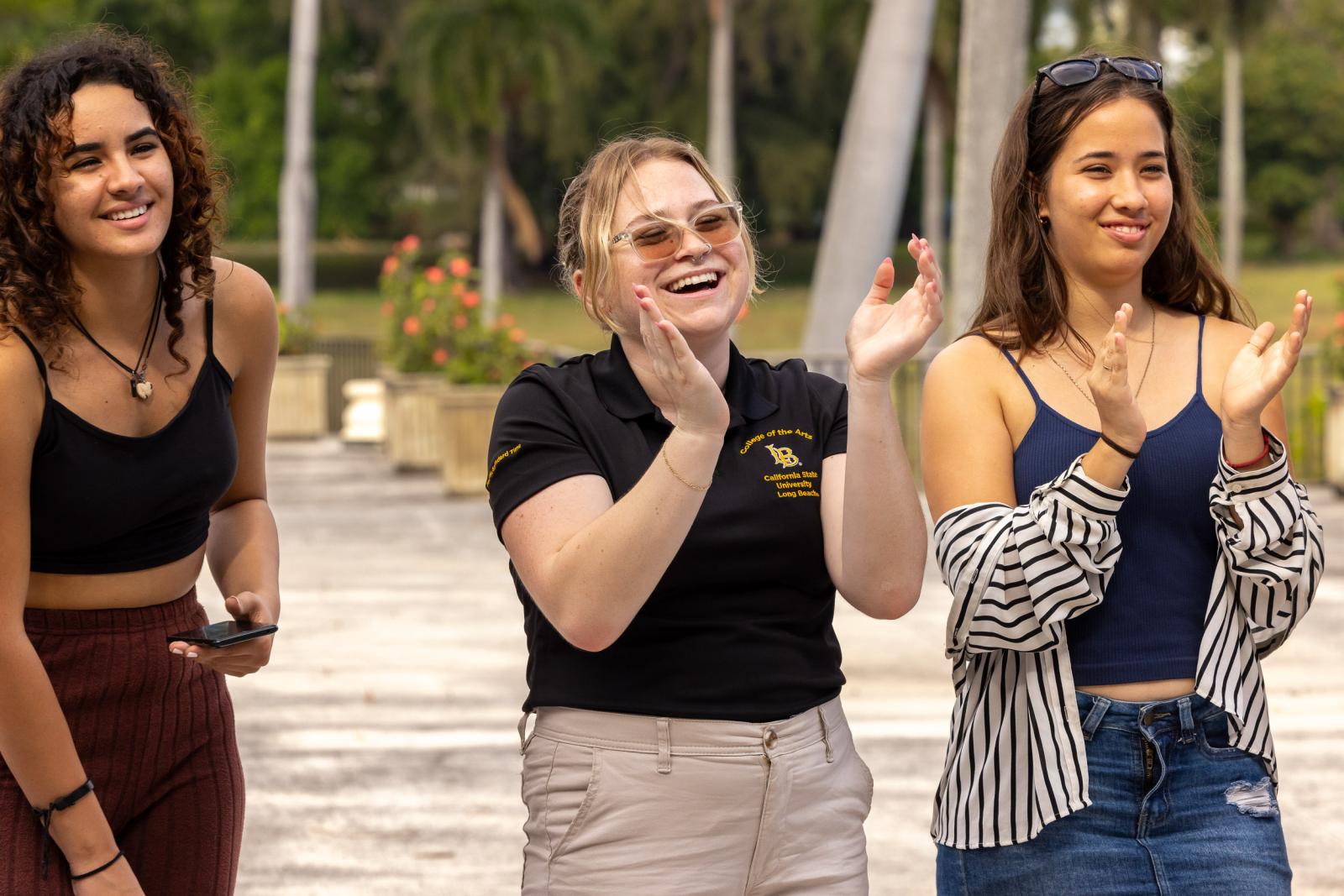 Maggie Robertson, center, surrounded by students from the National School of Arts
