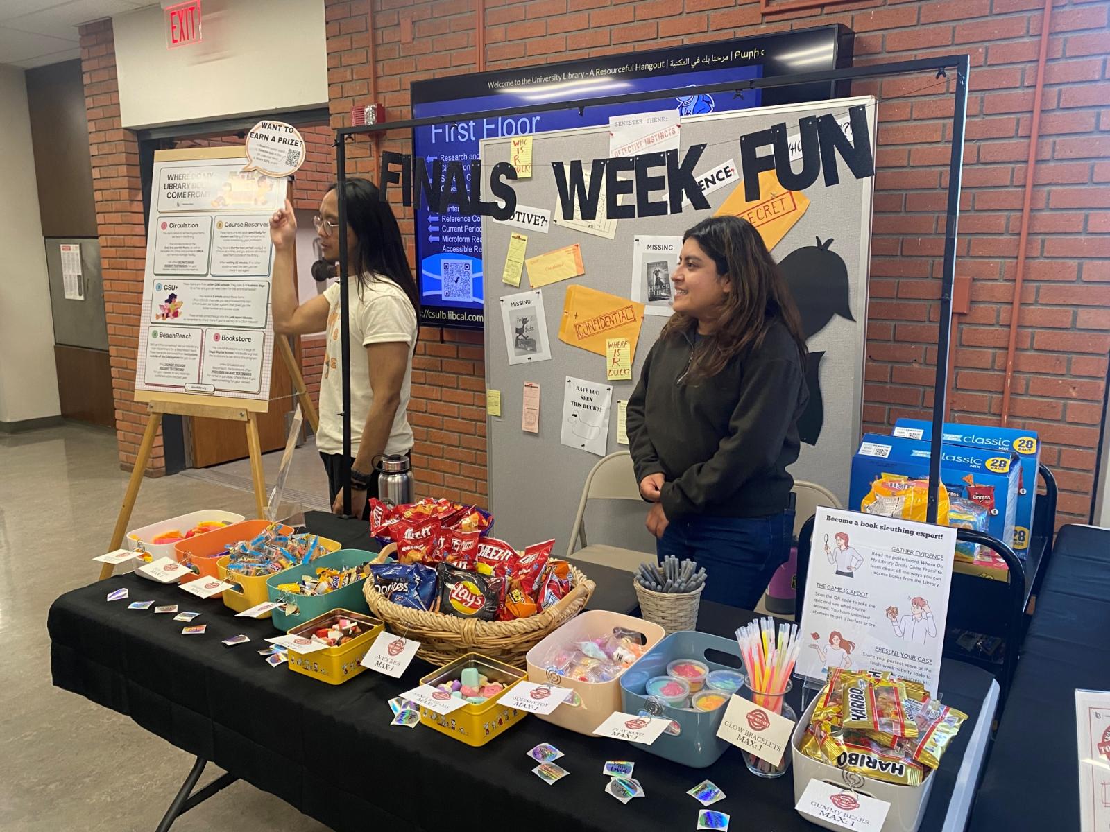 Library staff hosting finals week activities for students.