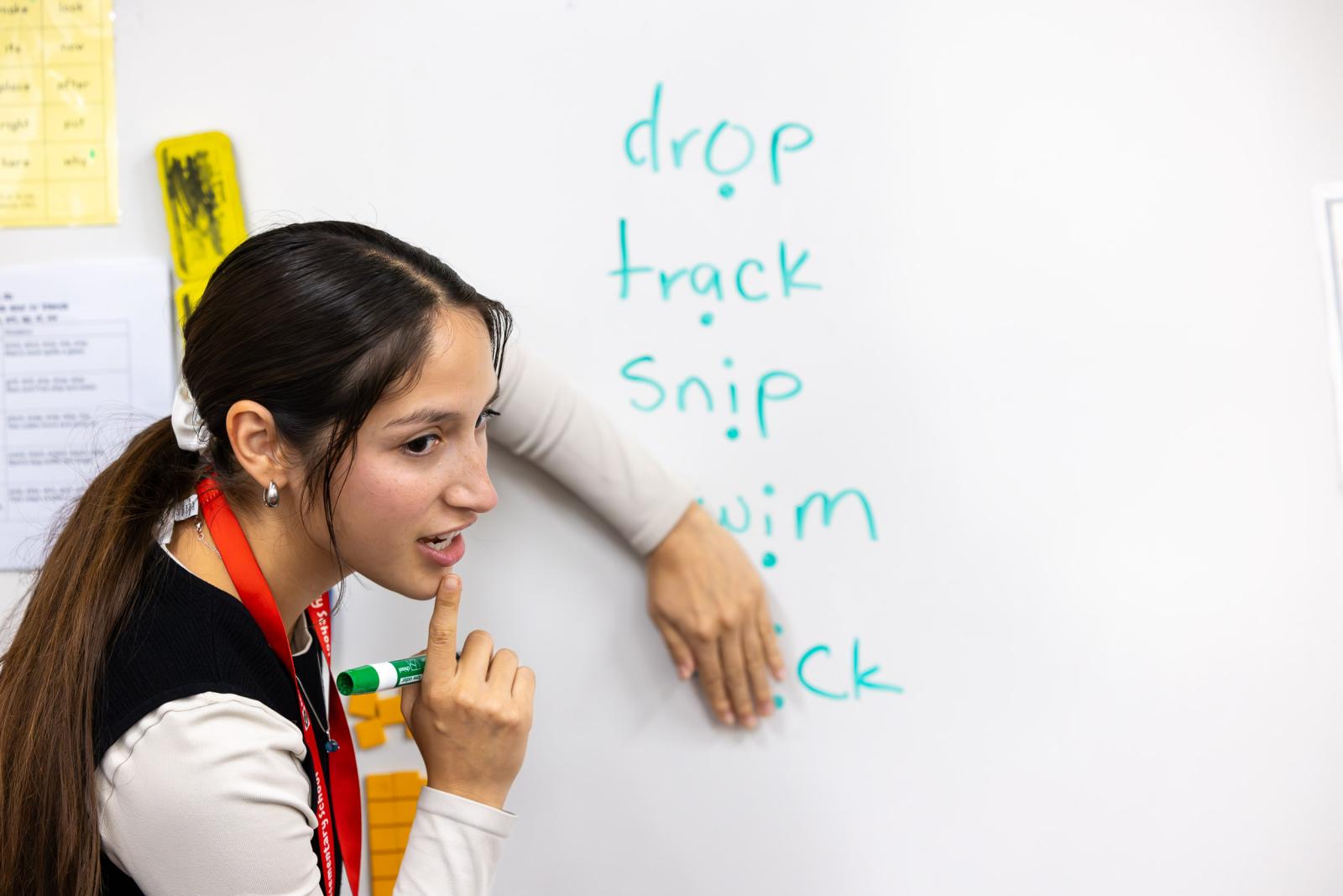Marlee Aguirre teaching at a whiteboard