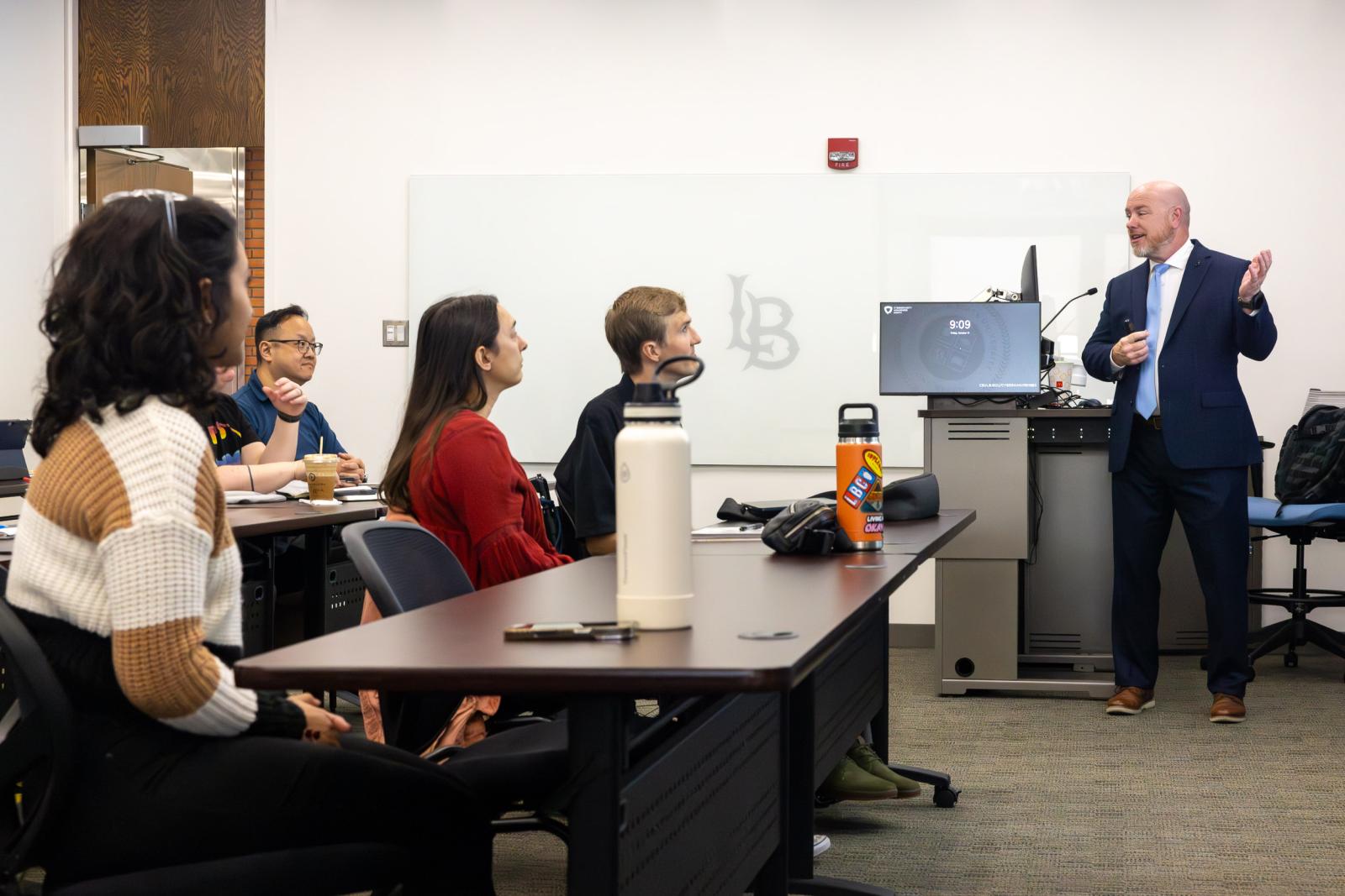 Marshall Thomas on the right leads the Vet Net Ally program at CSULB