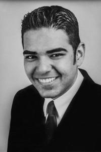 A black-and-white portrait of 2000-01 ASI President Robert Garcia