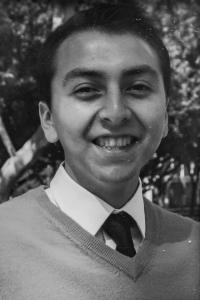 A black-and-white portrait of 2010-11 ASI President James Ahumada