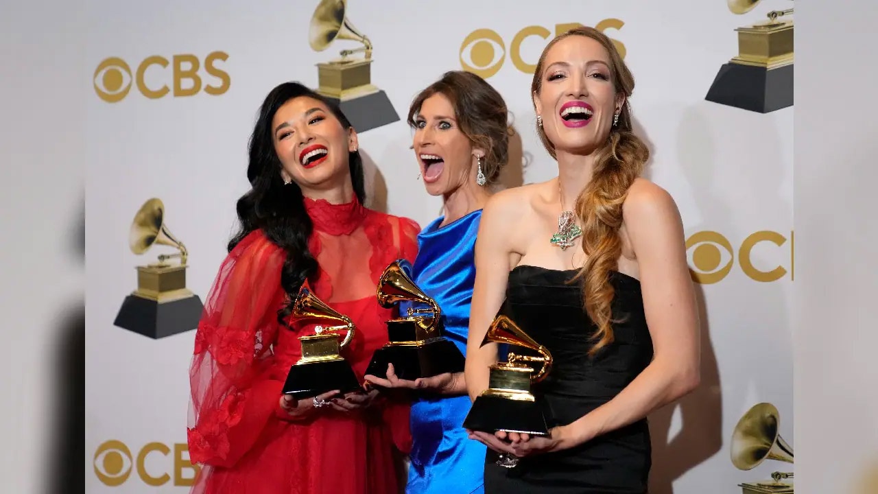 Sangeeta Kaur with two others at Grammy Awards