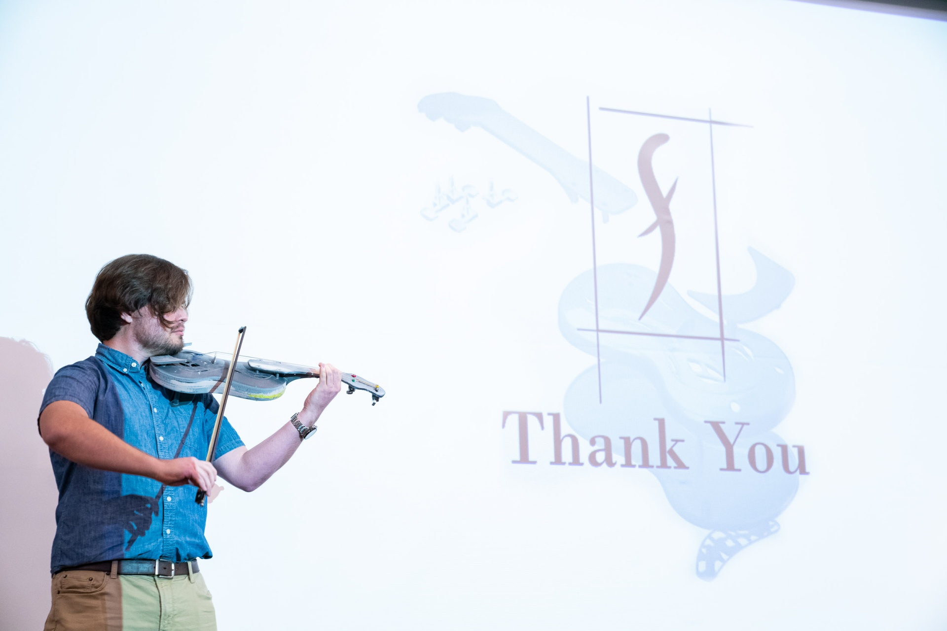 Ryon Adams demonstrates the sound quality of a prototype Proto-Lin violin